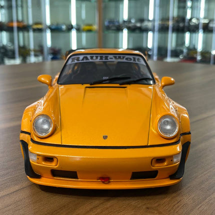 Solido 1/18 Porsche 964 RWB HIBIKI 2016 Orange Diecast Model Car - studio product photo of the scale model