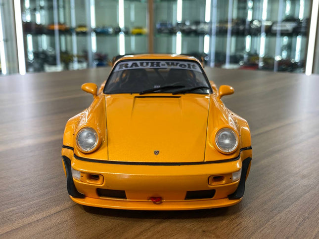 Solido 1/18 Porsche 964 RWB HIBIKI 2016 Orange Diecast Model Car - studio product photo of the scale model