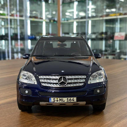 Minichamps Mercedes-Benz M-Class Blue 1/18 Scale Diecast Model Car - studio product photo of the scale model