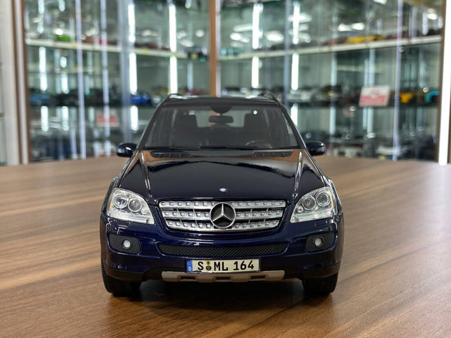 Minichamps Mercedes-Benz M-Class Blue 1/18 Scale Diecast Model Car - studio product photo of the scale model