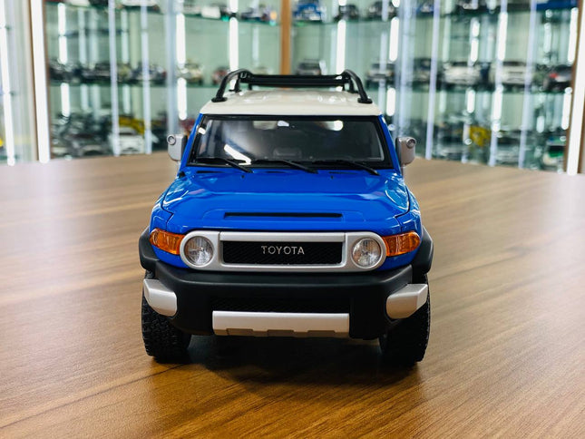 AutoArt Toyota FJ Cruiser Blue 1:18 Diecast Model Car - studio product photo of the scale model