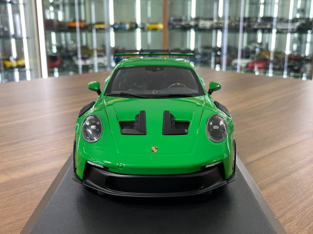 Minichamps Porsche 911 GT3 RS 2023 1:18 Diecast Model Car Green - studio product photo of the scale model