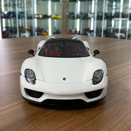 AutoArt Porsche 918 Spyder Weissach Package White/Black 1:18 Diecast Model Car - studio product photo of the scale model