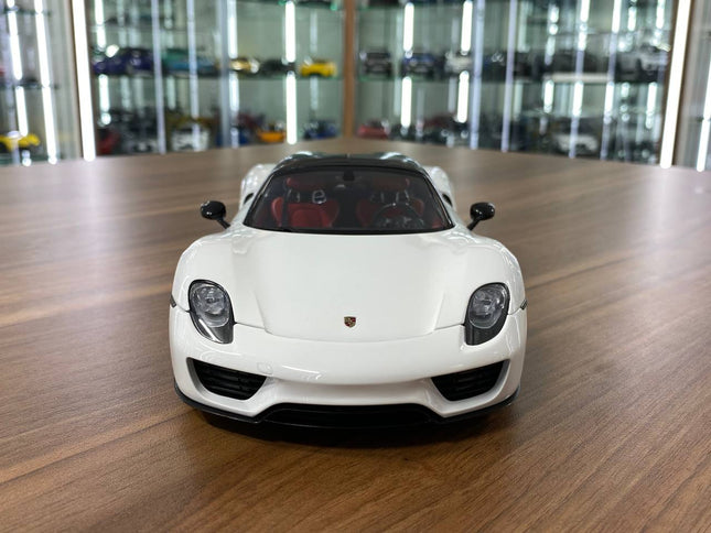 AutoArt Porsche 918 Spyder Weissach Package White/Black 1:18 Diecast Model Car - studio product photo of the scale model