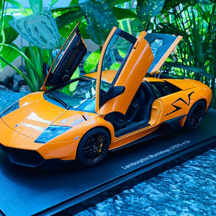 AutoArt Lamborghini Murcielago LP670-4 SV Orange 1:18 Diecast Model Car - studio product photo of the scale model