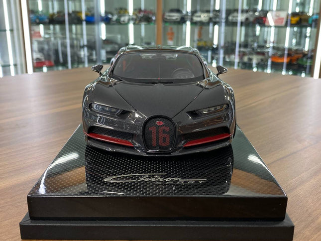 MR Collection Models Bugatti Chiron Sport with Open Wing 1/18 Grey Carbon Resin Model - studio product photo of the scale mod