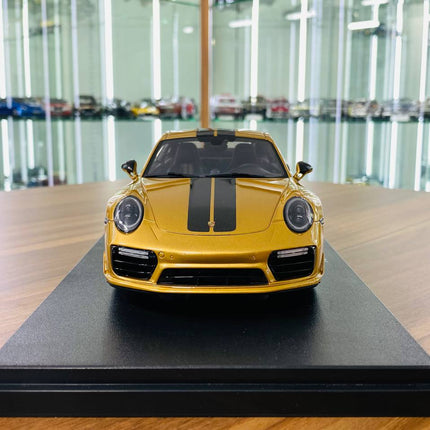 GT Spirit Porsche 911 Turbo S Resin Model 1/18 Gold Limited Edition - studio product photo of the scale model