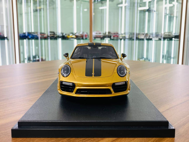 GT Spirit Porsche 911 Turbo S Resin Model 1/18 Gold Limited Edition - studio product photo of the scale model