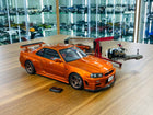 MotorHelix Nissan Skyline GT-R R34 Z-Tune Nismo 1/18 Diecast Model Metallic Orange - detailed collector display model
