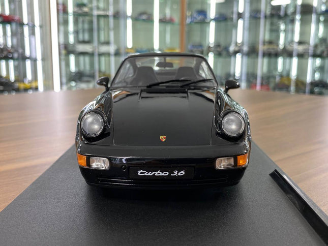Solido Porsche 964 Turbo 1/18 Diecast Model Car Black 1990 - studio product photo of the scale model