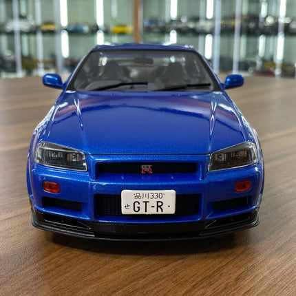 Solido 1/18 Nissan Skyline GT-R R34 Blue Diecast Model - studio product photo of the scale model