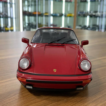 Solido Porsche 911 (930) Carrera 3.2 1984 1:18 Maroon Diecast Model Car - studio product photo of the scale model