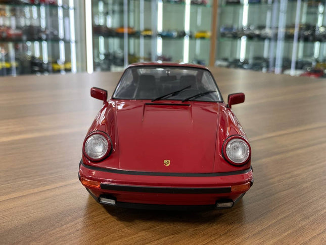 Solido Porsche 911 (930) Carrera 3.2 1984 1:18 Maroon Diecast Model Car - studio product photo of the scale model