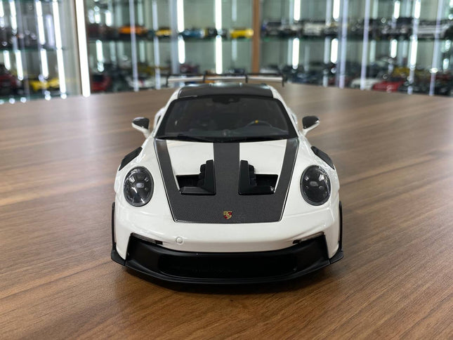 Minichamps Porsche 911 (992) GT3 RS 2022 Weissach Paket 1:18 Diecast Model White Blue - studio product photo of the scale mod