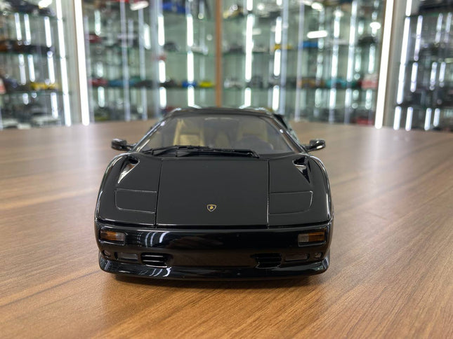 AutoArt Lamborghini Diablo Roadster Gloss Black 1:18 Diecast Model Car - studio product photo of the scale model
