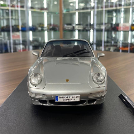 1:18 Porsche 911 (993) Carrera 4S 1995 Silver Diecast Model Car - studio product photo of the scale model