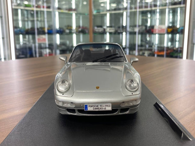 1:18 Porsche 911 (993) Carrera 4S 1995 Silver Diecast Model Car - studio product photo of the scale model