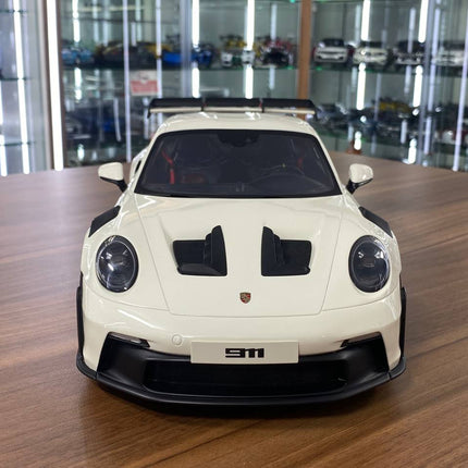 GT Spirit Porsche 911 (992) GT3 RS 1:12 Resin Model Car Off White Red Rim Limited Edition - studio product photo of the scale