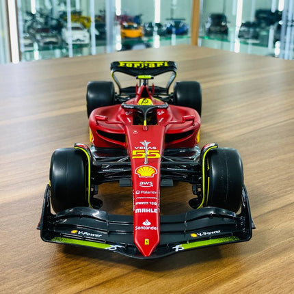 Bburago 1/18 Ferrari F1-75 C. Sainz #55 2022 Matt Red/Yellow Diecast Model - studio product photo of the scale model