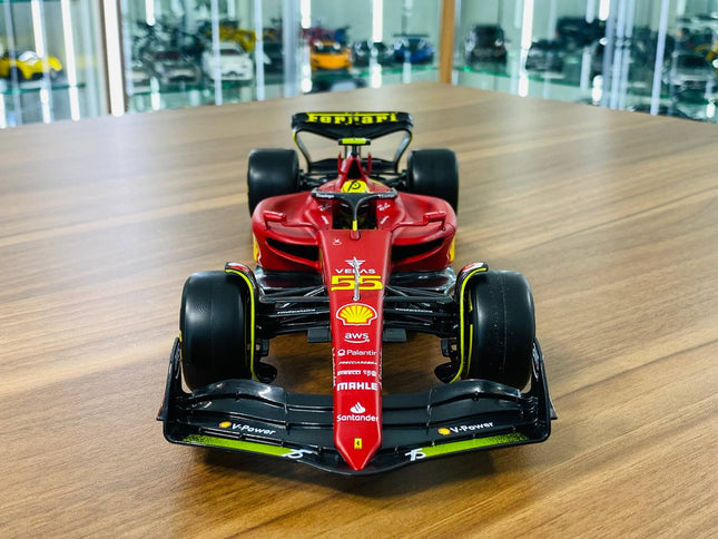 Bburago 1/18 Ferrari F1-75 C. Sainz #55 2022 Matt Red/Yellow Diecast Model - studio product photo of the scale model