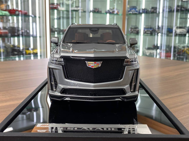 Silver 1:18 scale Cadillac Escalade V resin SUV model by MotorHelix, highly detailed replica