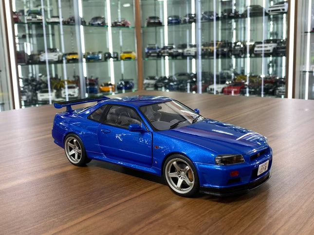 Solido 1/18 Nissan Skyline GT-R R34 Blue Diecast Model - detailed collector display model
