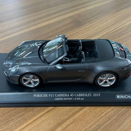 Minichamps 1/18 Porsche 911 Carrera 4S Cabriolet 2019 Grey Metallic - scale model for display