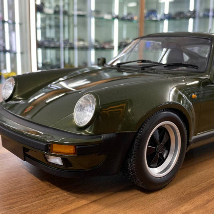 Minichamps Porsche 911 Turbo 1977 1/12 Diecast Model Olive - detailed die-cast style model