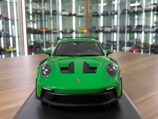 Minichamps 1:18 Porsche 911 GT3 RS 2023 Diecast Model Green - studio product photo of the scale model