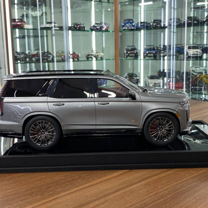 Silver Cadillac Escalade V resin scale model SUV, 1:18 MotorHelix collectible with crisp finish