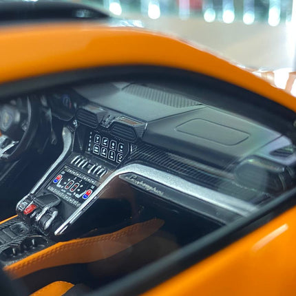 MR Collection Models Lamborghini Urus #63 1:18 Resin Model Orange Limited Edition - scale model collectible piece