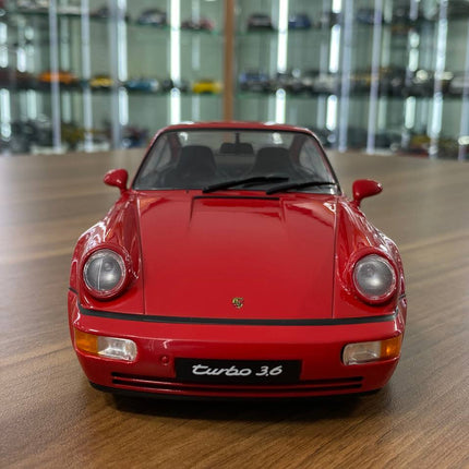 Solido 1/18 Diecast Porsche 911 964 Turbo 3.6 Roughe 1990 Dark Red Model Car - studio product photo of the scale model