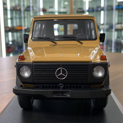 Minichamps Mercedes-Benz G-Model LWB 1980 1:18 Diecast Model Car Beige - studio product photo of the scale model
