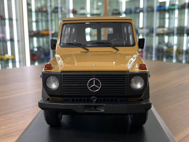 Minichamps Mercedes-Benz G-Model LWB 1980 1:18 Diecast Model Car Beige - studio product photo of the scale model