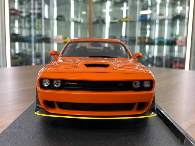 Solido 1:18 Diecast Dodge Challenger R/T Scat Pack Wide Body Hazzard Tribute 2023 Orange - studio product photo of the scale 