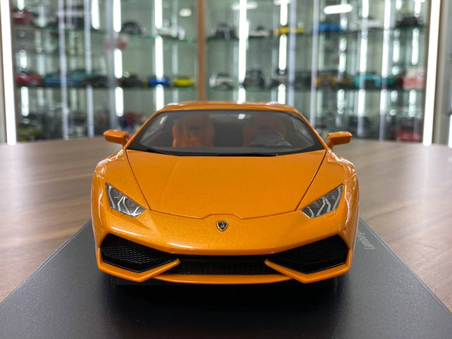 AutoArt Lamborghini Huracán LP610-4 Metal Orange Pearl Full Opening 1:18 Diecast Model Car - studio product photo of the scal