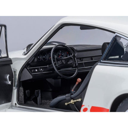https://cdn.shopify.com/s/files/1/0504/9925/6496/files/porsche-911-carrera-27-rs-grand-prix-white-with-red-stripes-and-wheels-118-model-car-by-autoart-298545.jpg?v=1756087277