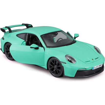 https://cdn.shopify.com/s/files/1/0504/9925/6496/products/porsche-911-gt3-light-green-124-diecast-model-car-by-bburago-725688.jpg?v=1748421368