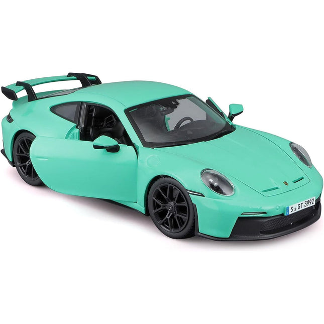 https://cdn.shopify.com/s/files/1/0504/9925/6496/products/porsche-911-gt3-light-green-124-diecast-model-car-by-bburago-725688.jpg?v=1748421368