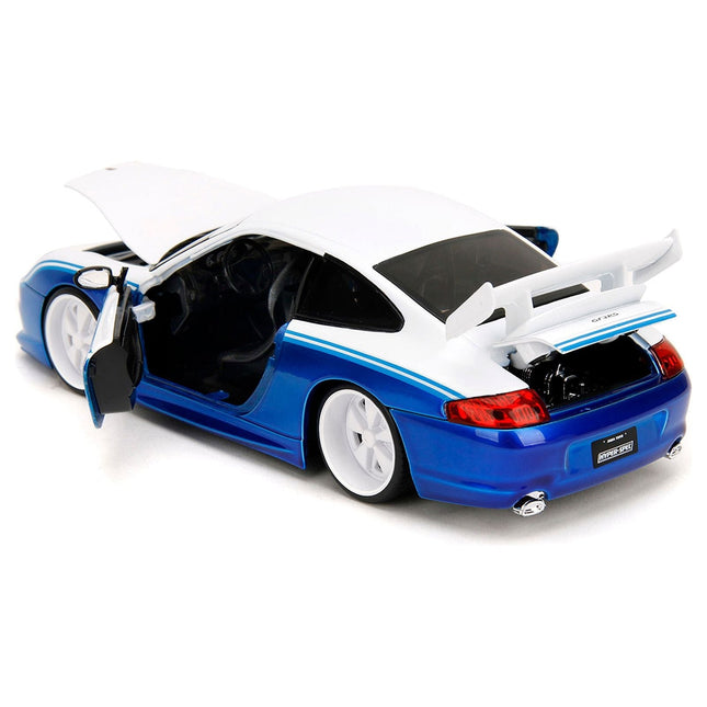 https://cdn.shopify.com/s/files/1/0504/9925/6496/files/porsche-911-gt3-rs-996-845-white-and-blue-metallic-toyo-tires-hyper-spec-series-124-diecast-model-car-by-jada-701897.jpg?v=1748404991