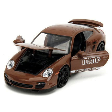 https://cdn.shopify.com/s/files/1/0504/9925/6496/files/porsche-911-turbo-brown-and-brown-mm-diecast-figure-mms-hollywood-rides-series-124-diecast-model-car-by-jada-212130.jpg?v=1756087349