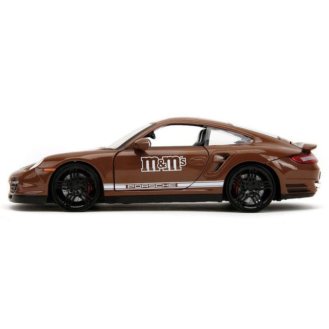 https://cdn.shopify.com/s/files/1/0504/9925/6496/files/porsche-911-turbo-brown-and-brown-mm-diecast-figure-mms-hollywood-rides-series-124-diecast-model-car-by-jada-510613.jpg?v=1756087350