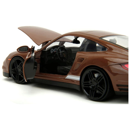 https://cdn.shopify.com/s/files/1/0504/9925/6496/files/porsche-911-turbo-brown-and-brown-mm-diecast-figure-mms-hollywood-rides-series-124-diecast-model-car-by-jada-692247.jpg?v=1748419125