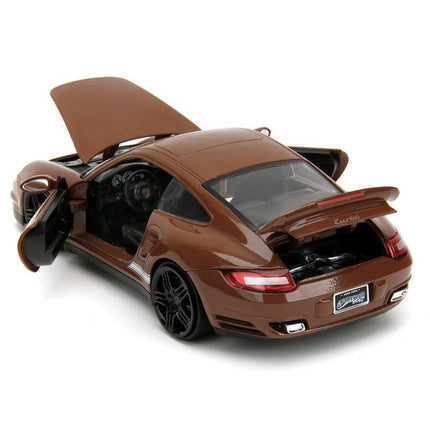 https://cdn.shopify.com/s/files/1/0504/9925/6496/files/porsche-911-turbo-brown-and-brown-mm-diecast-figure-mms-hollywood-rides-series-124-diecast-model-car-by-jada-737699.jpg?v=1756087350