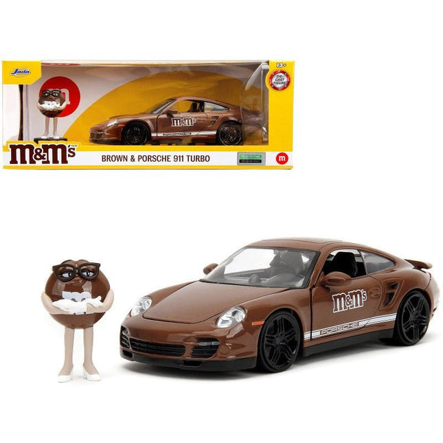 https://cdn.shopify.com/s/files/1/0504/9925/6496/files/porsche-911-turbo-brown-and-brown-mm-diecast-figure-mms-hollywood-rides-series-124-diecast-model-car-by-jada-839557.jpg?v=1756087351