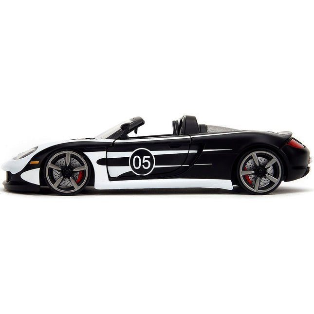 https://cdn.shopify.com/s/files/1/0504/9925/6496/files/porsche-carrera-gt-convertible-05-black-with-white-graphics-hyper-spec-series-124-diecast-model-car-by-jada-672813.jpg?v=1748404990