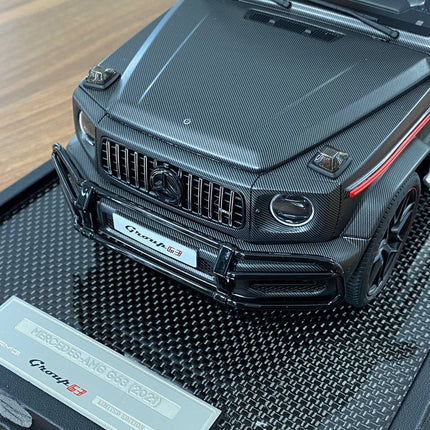 MotorHelix Mercedes-Benz G63 AMG W463 2021 1:18 Carbon Black Resin Model Car No Opening - showroom-quality model replica