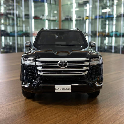 LCD Model Toyota Land Cruiser LC300 ZX Black 1:18 Diecast Model Car - studio product photo of the scale model
