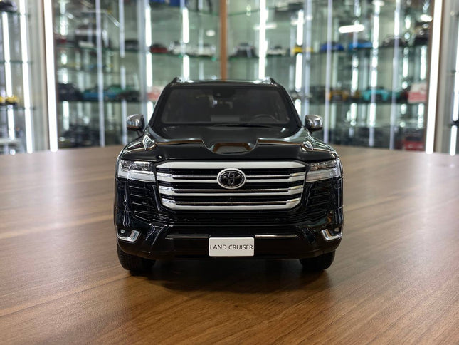 LCD Model Toyota Land Cruiser LC300 ZX Black 1:18 Diecast Model Car - studio product photo of the scale model