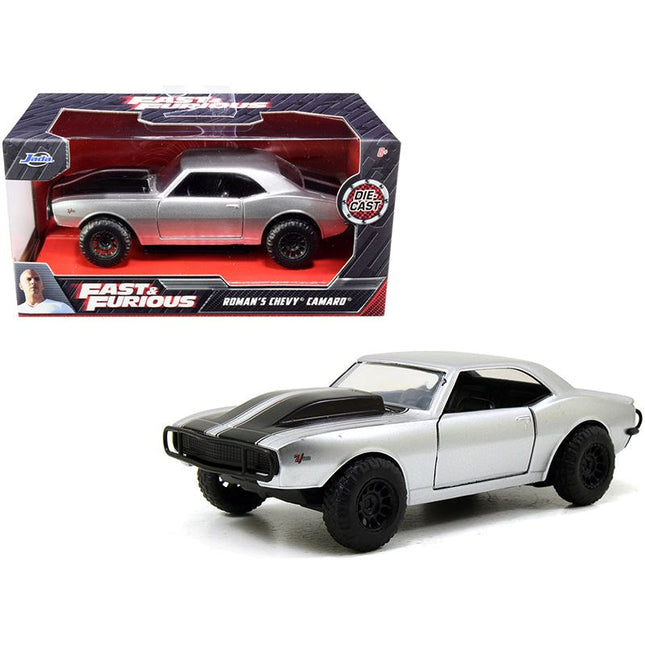 https://cdn.shopify.com/s/files/1/0504/9925/6496/files/romans-chevrolet-camaro-z28-silver-with-black-stripes-fast-furious-7-2015-movie-132-diecast-model-car-by-jada-615098.jpg?v=1748419485